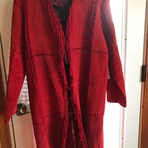 Suede rust fringe coat.
